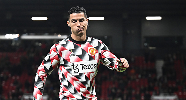 Manchester United's Portuguese striker Cristiano Ronaldo reacts during the warm up prior to the English Premier League football match between Manchester United and Tottenham Hotspur at Old Trafford in Manchester, north west England, on October 19, 2022. (Photo by Oli SCARFF / AFP)