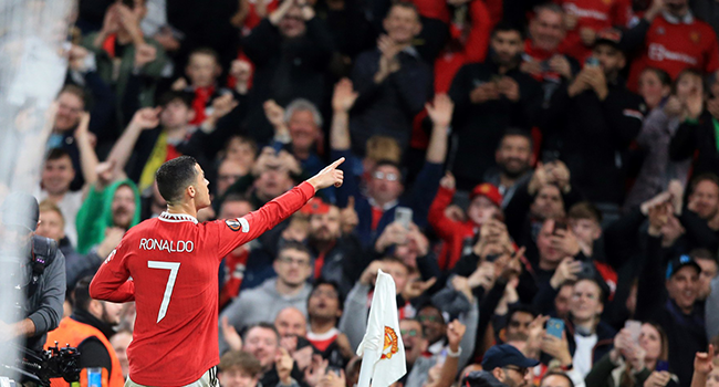 Manchester United's Portuguese striker Cristiano Ronaldo celebrates scoring the team's third goal during the UEFA Europa League Group E football match between Manchester United and Sheriff Tiraspol, at Old Trafford stadium, in Manchester, north-west England, on October 27, 2022. (Photo by Lindsey Parnaby / AFP)