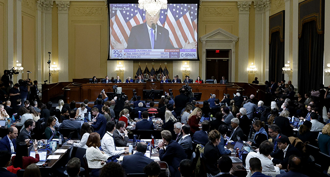 A video is shown of former US President Donald Trump at the US House Select Committee hearing to Investigate the January 6 Attack on the US Capitol, on Capitol Hill in Washington, DC, on October 13, 2022. (Photo by JONATHAN ERNST / POOL / AFP)