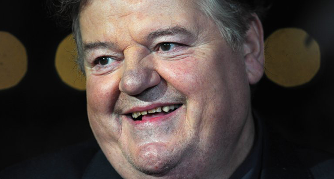 In this file photo taken on October 21, 2012 British actor Robbie Coltrane attends the premiere for the film 'Great Expectations' on the closing night of the 56th BFI London Film Festival in central London. (Photo by CARL COURT / AFP)