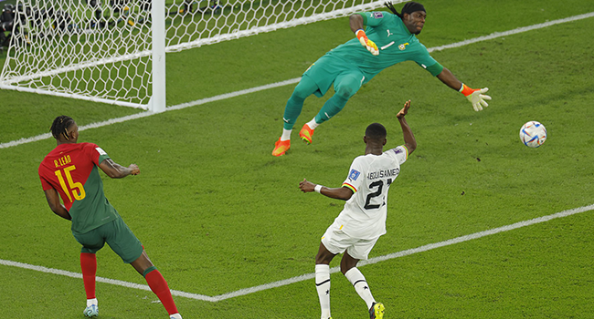 Portugal's forward #15 Rafael Leao scores his team's third goal during the Qatar 2022 World Cup Group H football match between Portugal and Ghana at Stadium 974 in Doha on November 24, 2022. (Photo by Odd ANDERSEN / AFP)