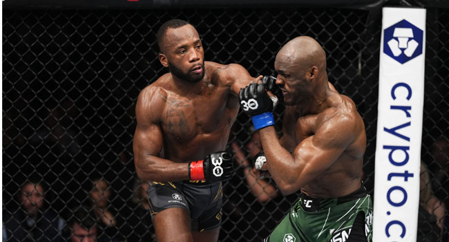 Photo of Leon Edward landing a punch on Kamaru Usman at the welterweight title fight in London on 19th March 2023