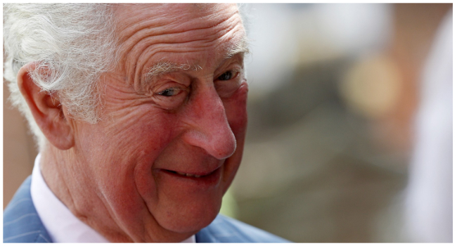 In this file photo taken on May 25, 2021 Britain's Prince Charles, Prince of Wales, reacts during his visit to the Coventry Church Municipal Charities Bond's Hospital in Coventry, central England, to celebrate the Association's 75th anniversary. (Photo by Darren Staples / POOL / AFP) 