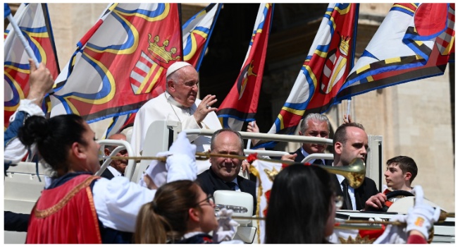 Pope Francis is seen at the end of his weekly general audience at St. Peters' square in the Vatican on May 24, 2023. (Photo by Vincenzo PINTO / AFP)