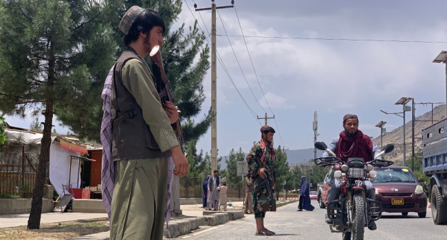 A member of Taliban stands guard near the site of a suicide attack in Faizabad district of Badakhshan province on June 6, 2023. The acting governor of an Afghan province was killed by a suicide bomber on June 6, officials said, months after the region's police chief was killed in a similar attack claimed by the Islamic State group. (Photo by Omer ABRAR / AFP)