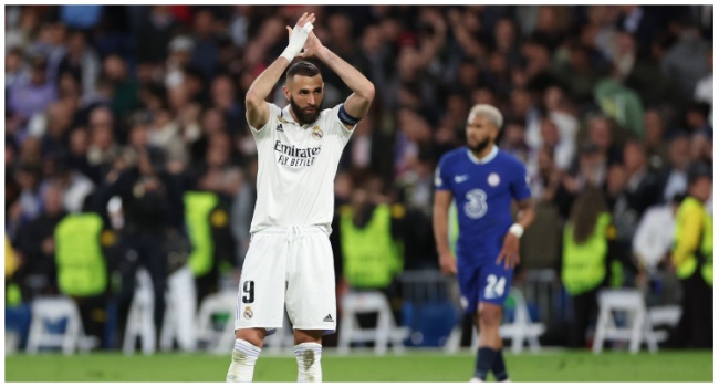 (FILES) Real Madrid's French forward Karim Benzema celebrates their victory at the end of the UEFA Champions League quarter final first leg football match between Real Madrid CF and Chelsea FC at the Santiago Bernabeu stadium in Madrid on April 12, 2023.  (Photo by Pierre-Philippe MARCOU / AFP)