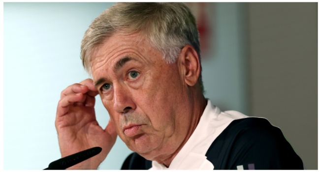 Real Madrid's Italian coach Carlo Ancelotti gestures during a press conference after a training session at Valdebebas Sport City in Madrid on August 11, 2023. (Photo by PIERRE-PHILIPPE MARCOU / AFP)