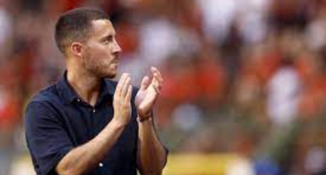 Former Red Devils captain Eden Hazard greets fans during a ceremony for the end of his career with the Belgian national team Red Devils, prior to the UEFA Euro 2024 group F qualification football match between Belgium and Austria at the King Baudouin Stadium in Brussels, on June 17, 2023.