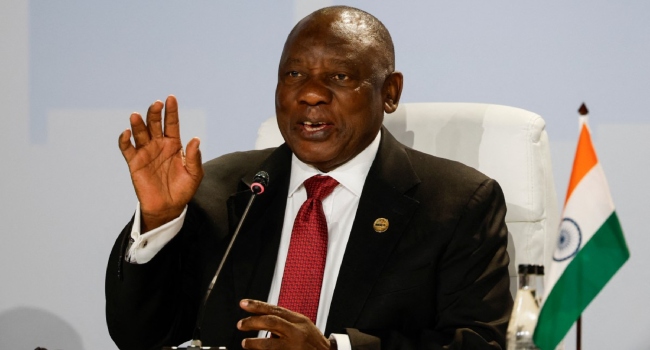 South African President Cyril Ramaphosa gestures during the 2023 BRICS Summit at the Sandton Convention Centre in Johannesburg on August 24, 2023.