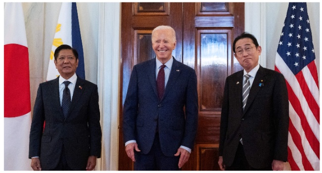 US President Joe Biden speaks to the press with Japanese Prime Minister Fumio Kishida (R) and Filipino President Ferdinand Marcos Jr. (L) ahead of a trilateral meeting at the White House in Washington, DC, on April 11, 2024. (Photo by ANDREW CABALLERO-REYNOLDS / AFP)