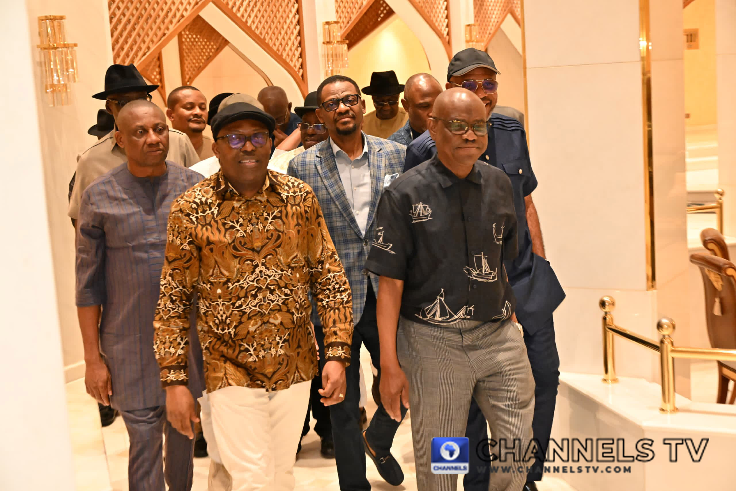 Governor Fubara (l) with FCT Minister Nyesom Wike (r) followed by members of Rivers State Assembly at the Aso Villa.