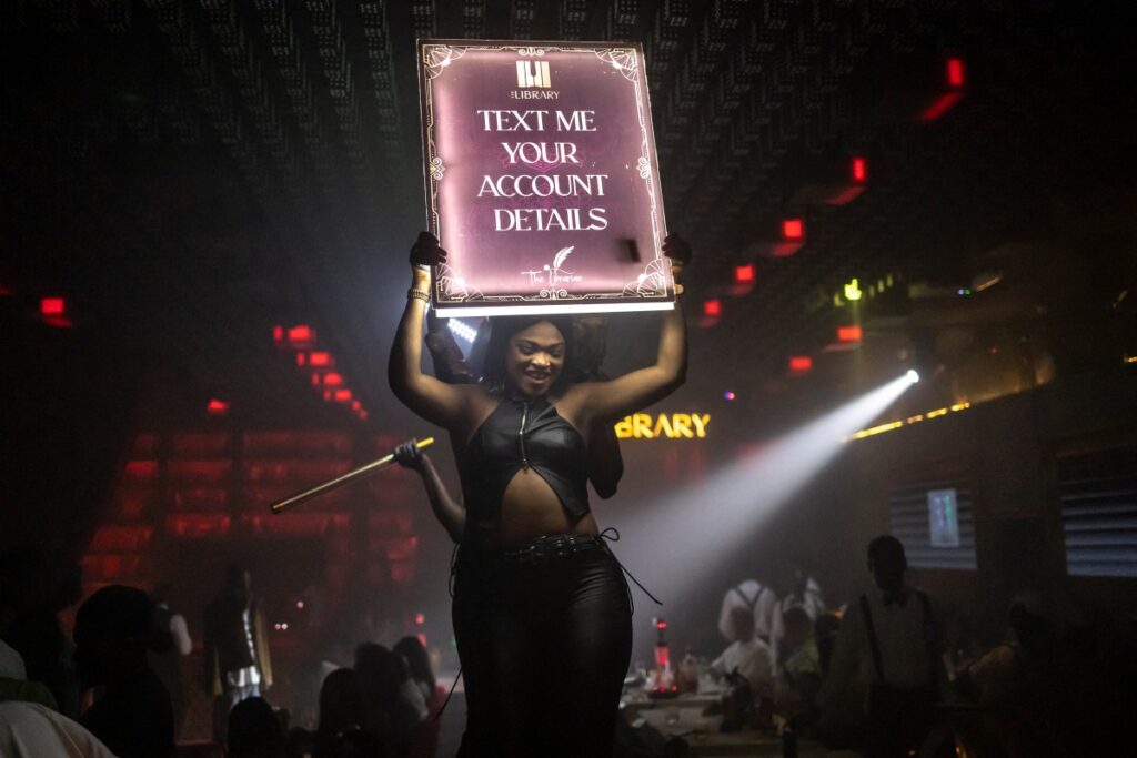 AFP 20251208 87CP7CW v2 MidRes TopshotFilesNigeriaNightclubSocietyFeature 1