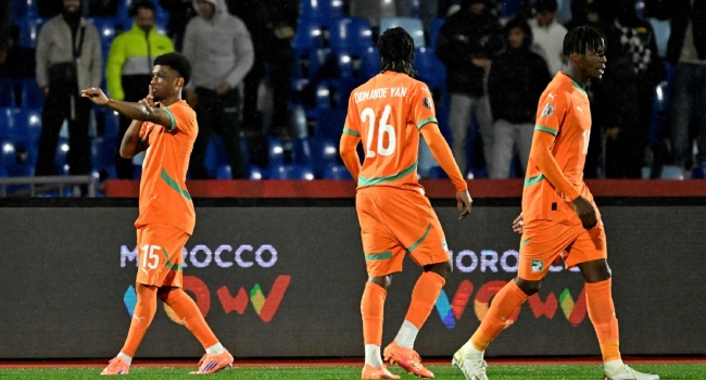 Ivory Coast's forward #15 Amad Diallo (L) celebrates scoring the team's first goal during the Africa Cup of Nations (CAN) Group F football match between Ivory Coast and Mozambique at Marrakesh Stadium in Marrakesh on December 24, 2025. (Photo by Khaled DESOUKI / AFP)