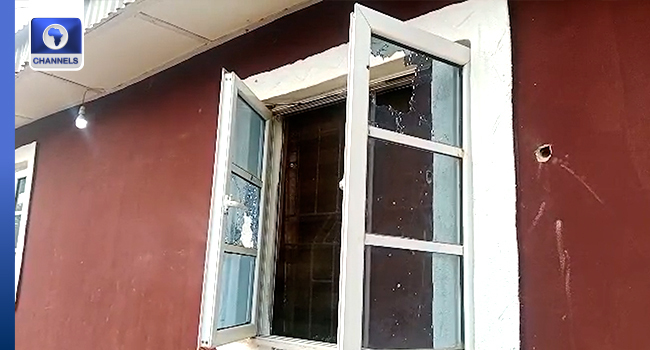 Security officials and community members gather at the palace of the slain Ondo monarch following the fatal attack in Akure North