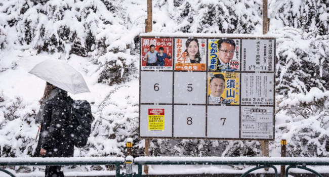 Japan Votes In Snow-hit Snap Polls 