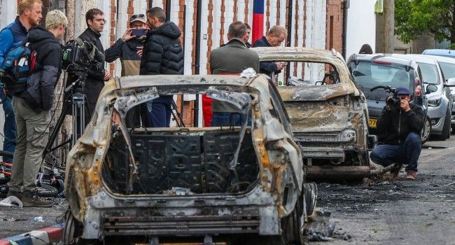 Protesters Torch Buildings And Vehicles, Block Roa